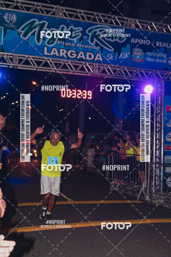 Buy your photos of the eventNight Run 5K 10K Praia Grande on Fotop
