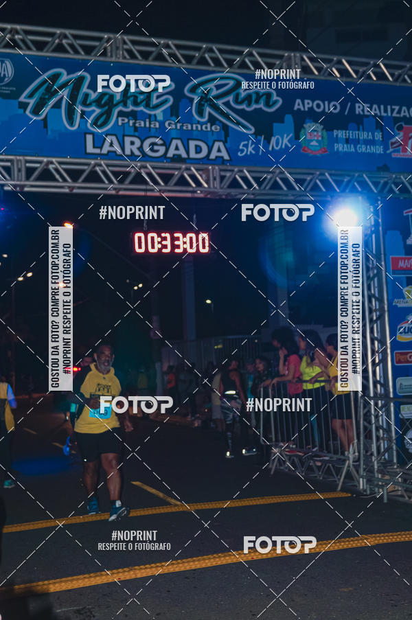 Buy your photos of the eventNight Run 5K 10K Praia Grande on Fotop