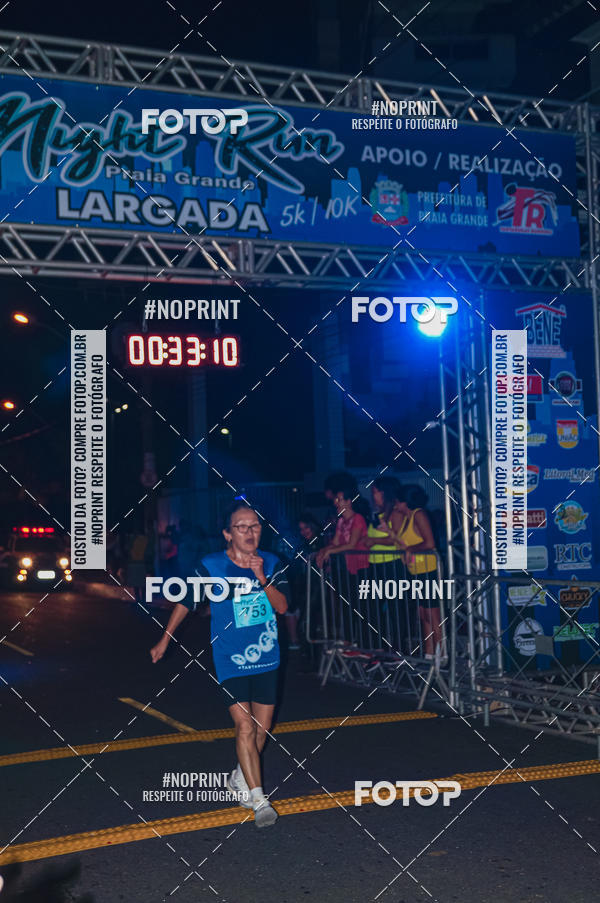 Buy your photos of the eventNight Run 5K 10K Praia Grande on Fotop