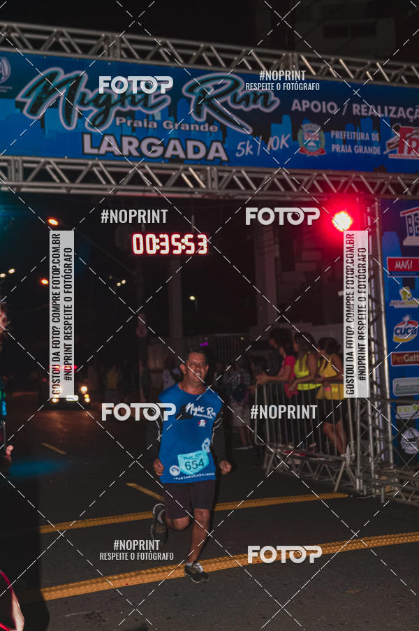Buy your photos of the eventNight Run 5K 10K Praia Grande on Fotop
