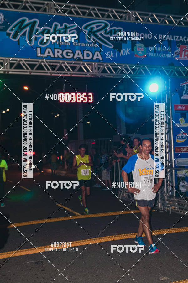 Buy your photos of the eventNight Run 5K 10K Praia Grande on Fotop