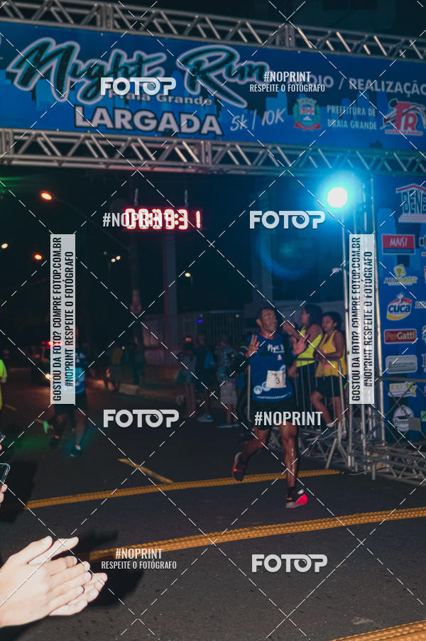 Buy your photos of the eventNight Run 5K 10K Praia Grande on Fotop