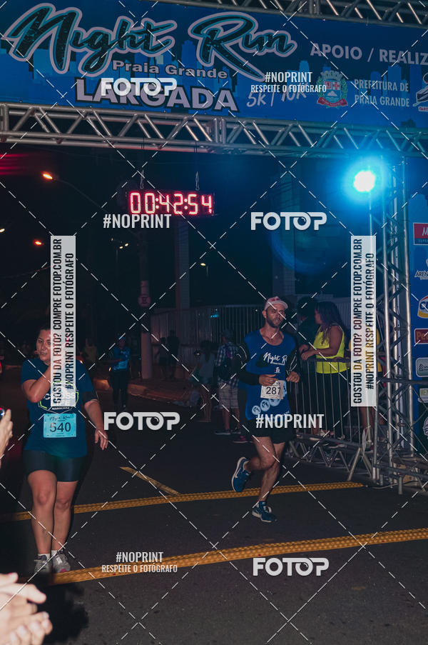 Buy your photos of the eventNight Run 5K 10K Praia Grande on Fotop