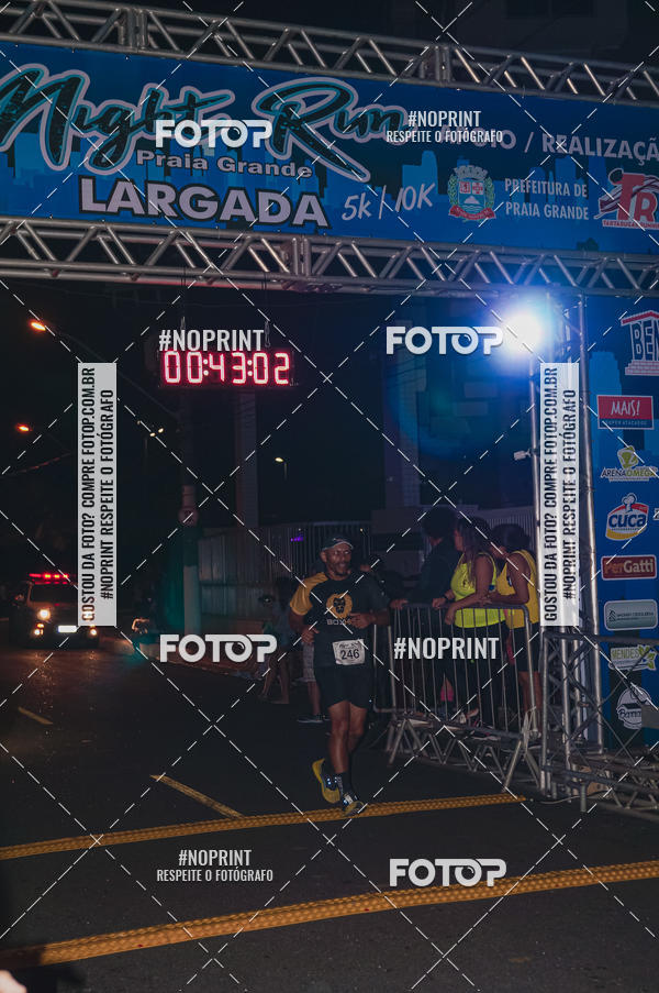 Buy your photos of the eventNight Run 5K 10K Praia Grande on Fotop