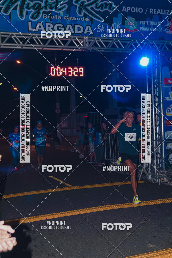 Buy your photos of the eventNight Run 5K 10K Praia Grande on Fotop