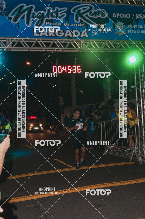 Buy your photos of the eventNight Run 5K 10K Praia Grande on Fotop