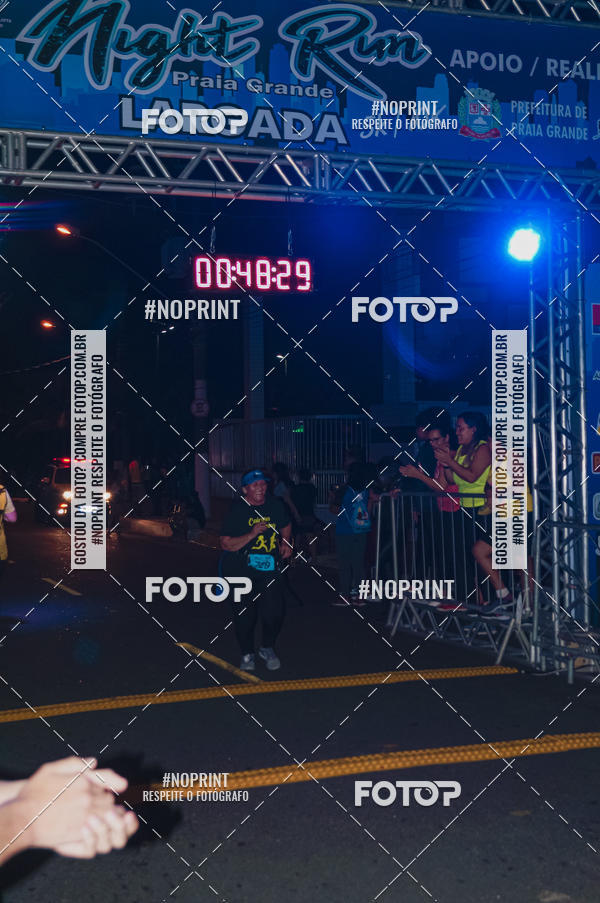 Buy your photos of the eventNight Run 5K 10K Praia Grande on Fotop