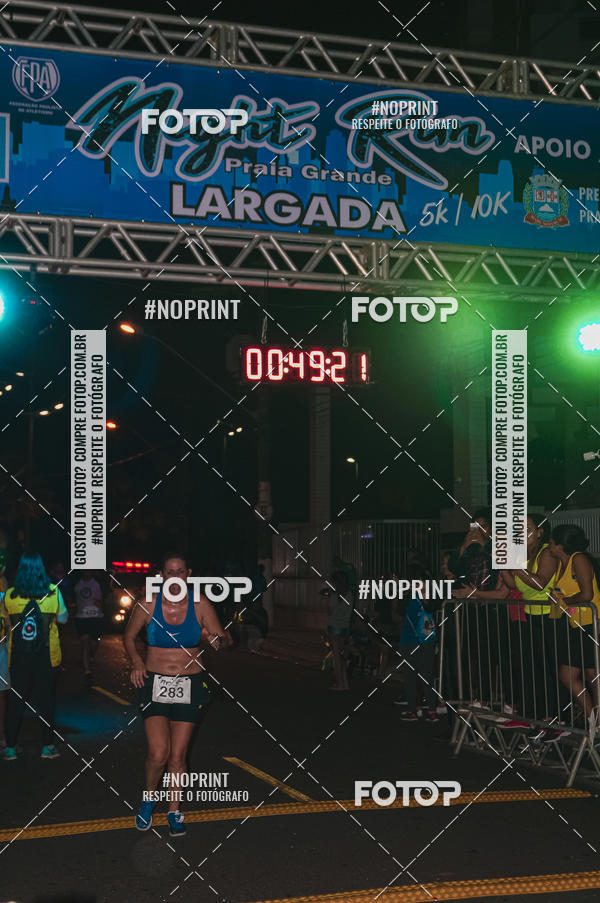 Buy your photos of the eventNight Run 5K 10K Praia Grande on Fotop