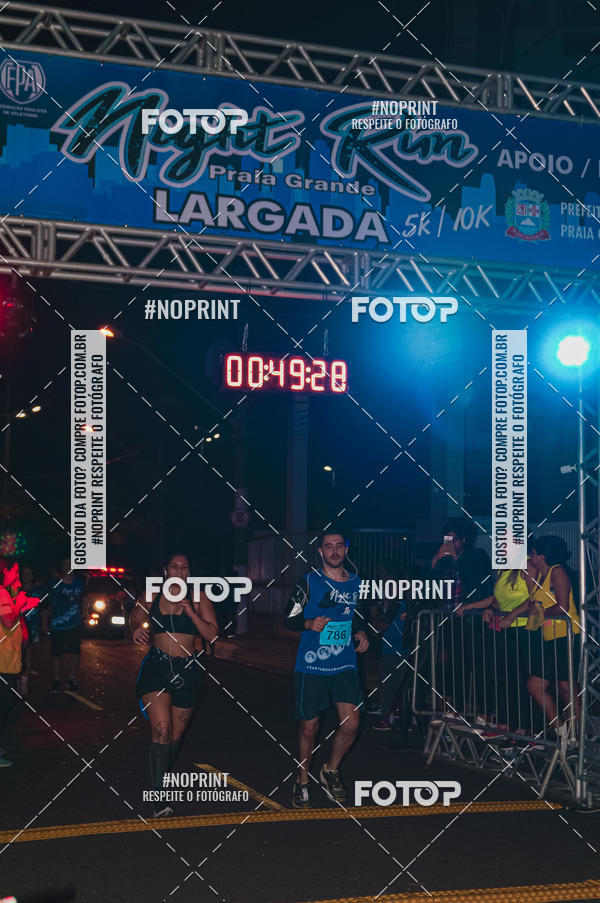 Buy your photos of the eventNight Run 5K 10K Praia Grande on Fotop