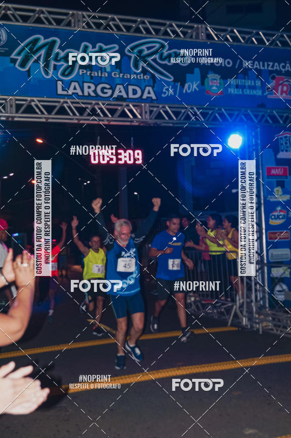 Buy your photos of the eventNight Run 5K 10K Praia Grande on Fotop