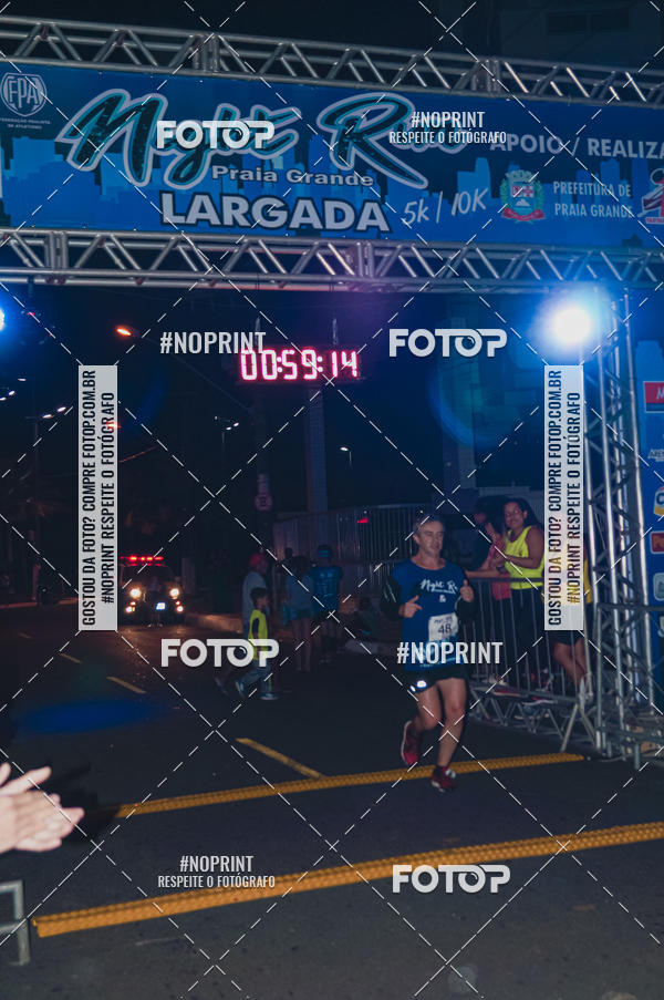 Buy your photos of the eventNight Run 5K 10K Praia Grande on Fotop
