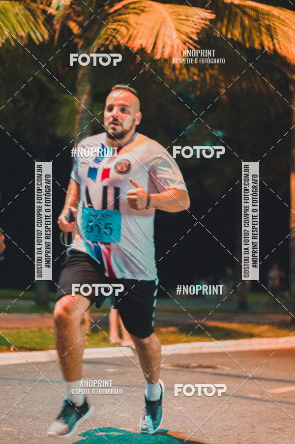 Buy your photos of the eventNight Run 5K 10K Praia Grande on Fotop