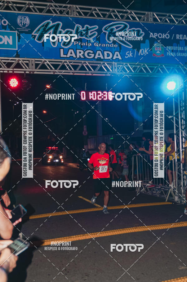 Buy your photos of the eventNight Run 5K 10K Praia Grande on Fotop