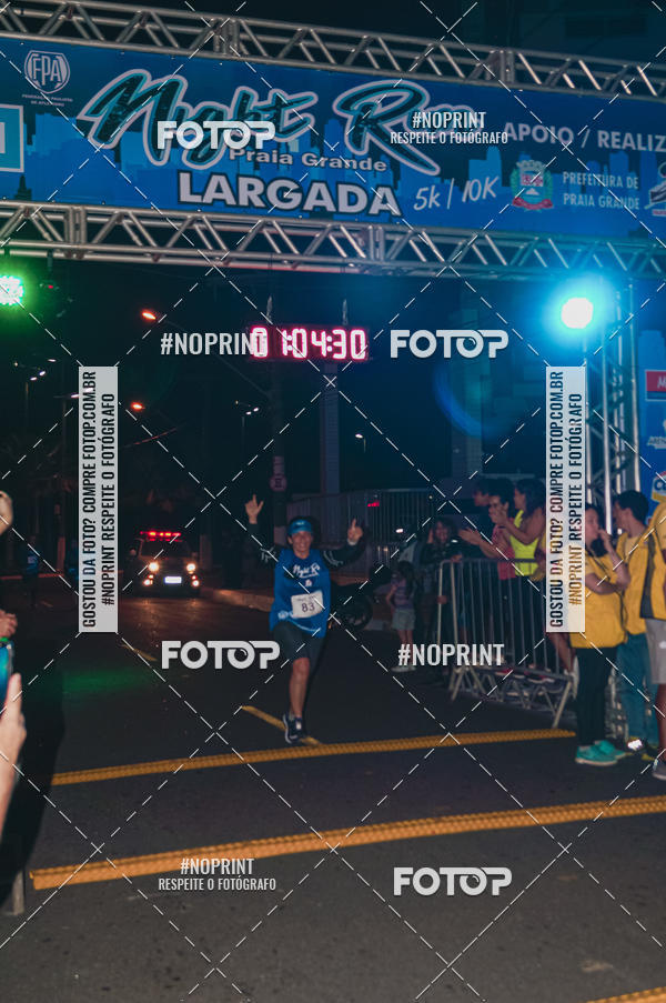 Buy your photos of the eventNight Run 5K 10K Praia Grande on Fotop