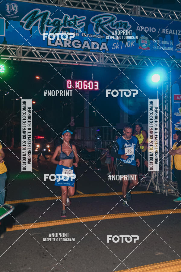 Buy your photos of the eventNight Run 5K 10K Praia Grande on Fotop