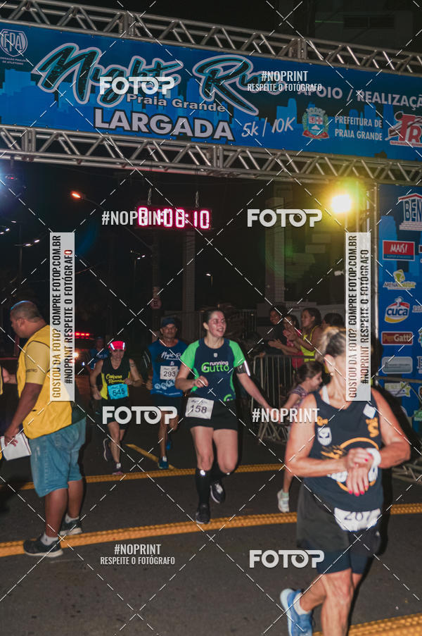Buy your photos of the eventNight Run 5K 10K Praia Grande on Fotop