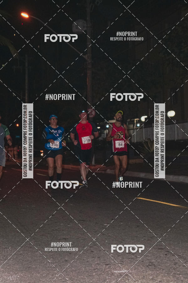 Buy your photos of the eventNight Run 5K 10K Praia Grande on Fotop