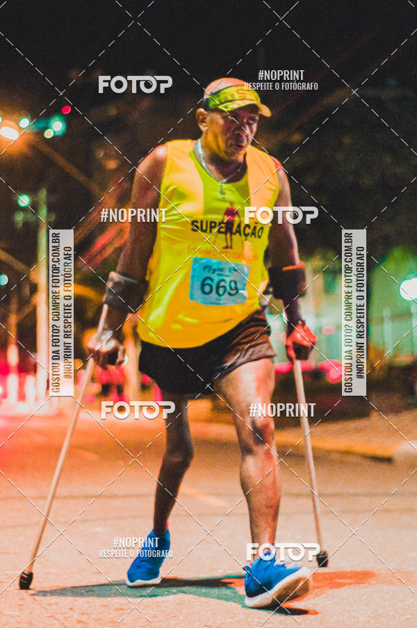 Buy your photos of the eventNight Run 5K 10K Praia Grande on Fotop