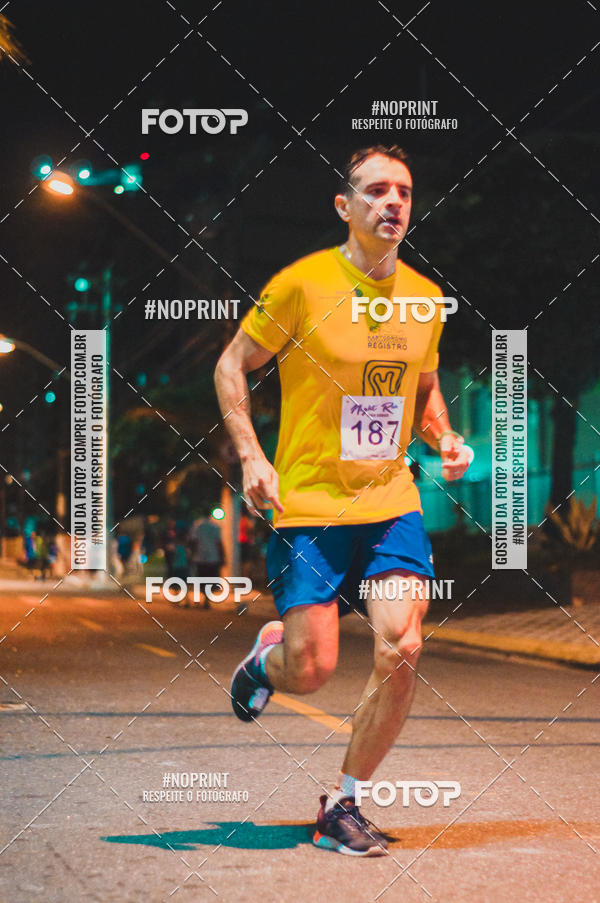 Buy your photos of the eventNight Run 5K 10K Praia Grande on Fotop
