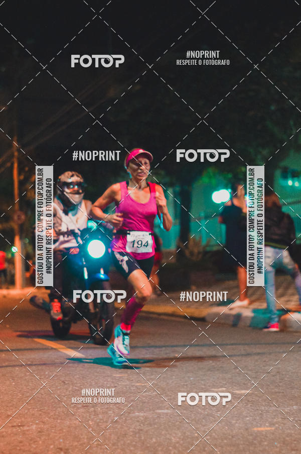 Buy your photos of the eventNight Run 5K 10K Praia Grande on Fotop
