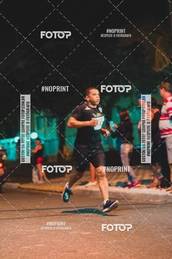 Buy your photos of the eventNight Run 5K 10K Praia Grande on Fotop