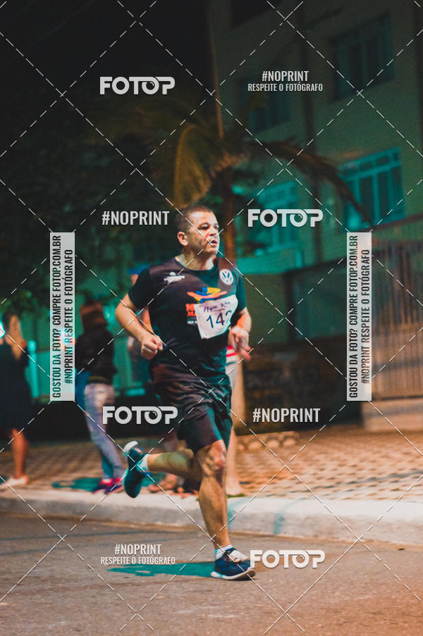 Buy your photos of the eventNight Run 5K 10K Praia Grande on Fotop