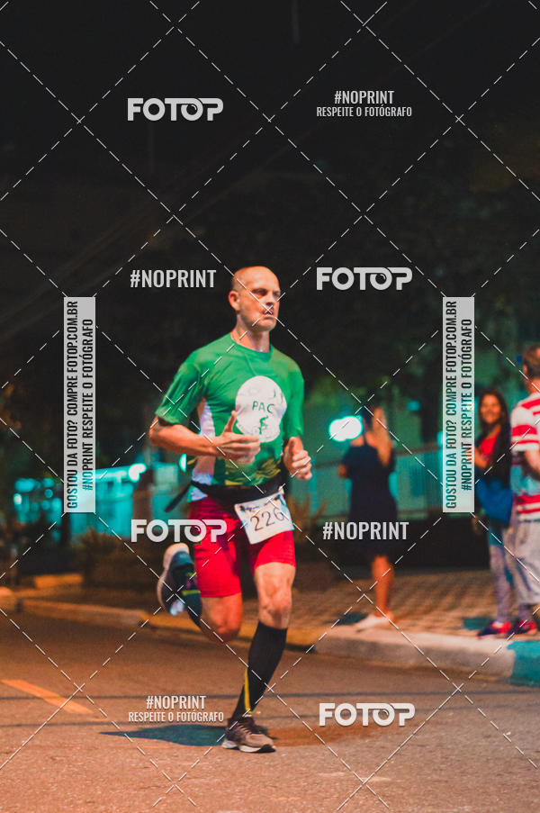 Buy your photos of the eventNight Run 5K 10K Praia Grande on Fotop