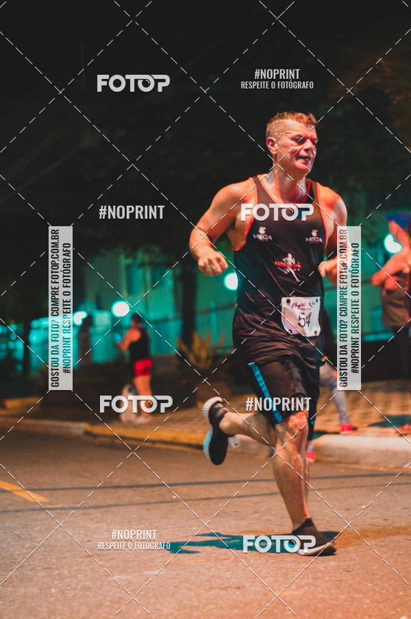 Buy your photos of the eventNight Run 5K 10K Praia Grande on Fotop