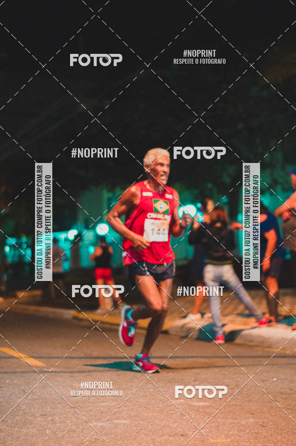 Buy your photos of the eventNight Run 5K 10K Praia Grande on Fotop