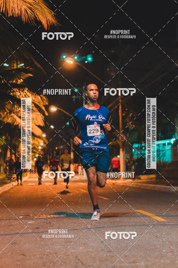 Buy your photos of the eventNight Run 5K 10K Praia Grande on Fotop