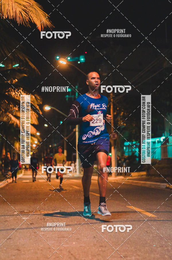 Buy your photos of the eventNight Run 5K 10K Praia Grande on Fotop