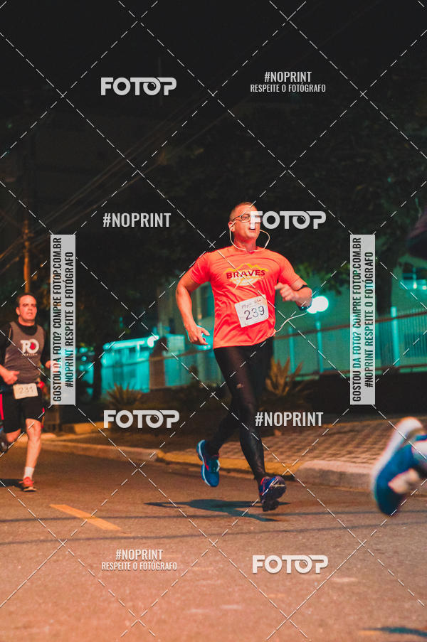 Buy your photos of the eventNight Run 5K 10K Praia Grande on Fotop