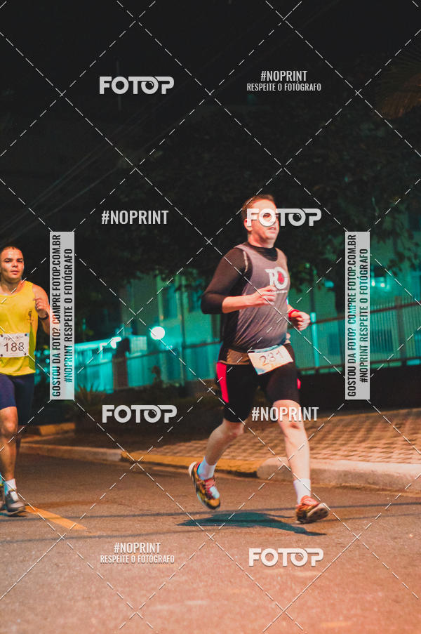 Buy your photos of the eventNight Run 5K 10K Praia Grande on Fotop