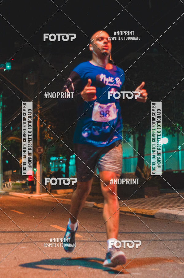 Buy your photos of the eventNight Run 5K 10K Praia Grande on Fotop