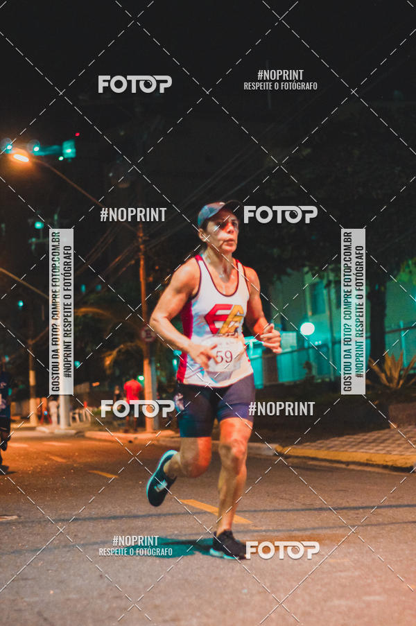 Buy your photos of the eventNight Run 5K 10K Praia Grande on Fotop
