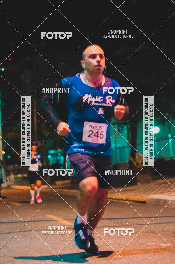 Buy your photos of the eventNight Run 5K 10K Praia Grande on Fotop