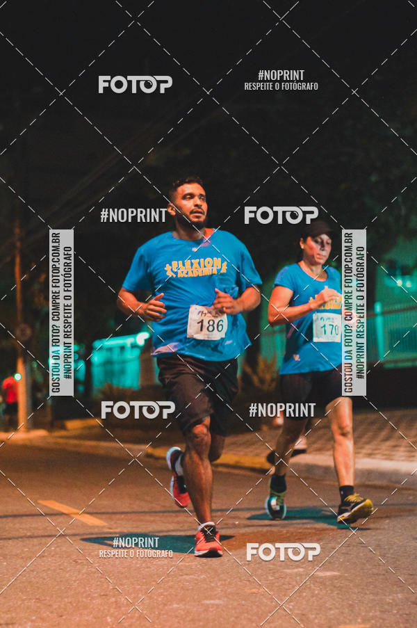 Buy your photos of the eventNight Run 5K 10K Praia Grande on Fotop