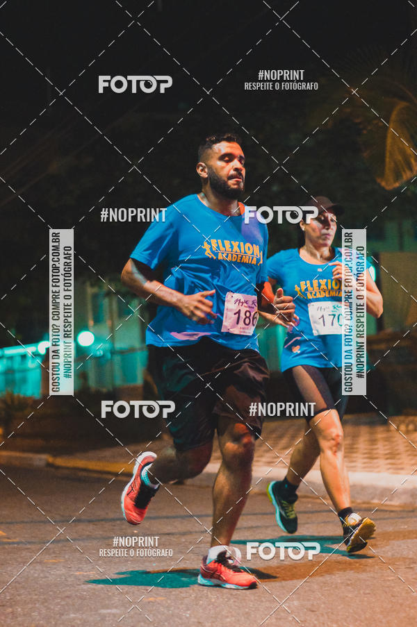 Buy your photos of the eventNight Run 5K 10K Praia Grande on Fotop