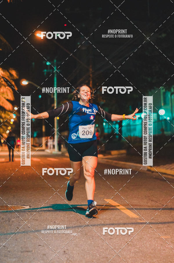 Buy your photos of the eventNight Run 5K 10K Praia Grande on Fotop