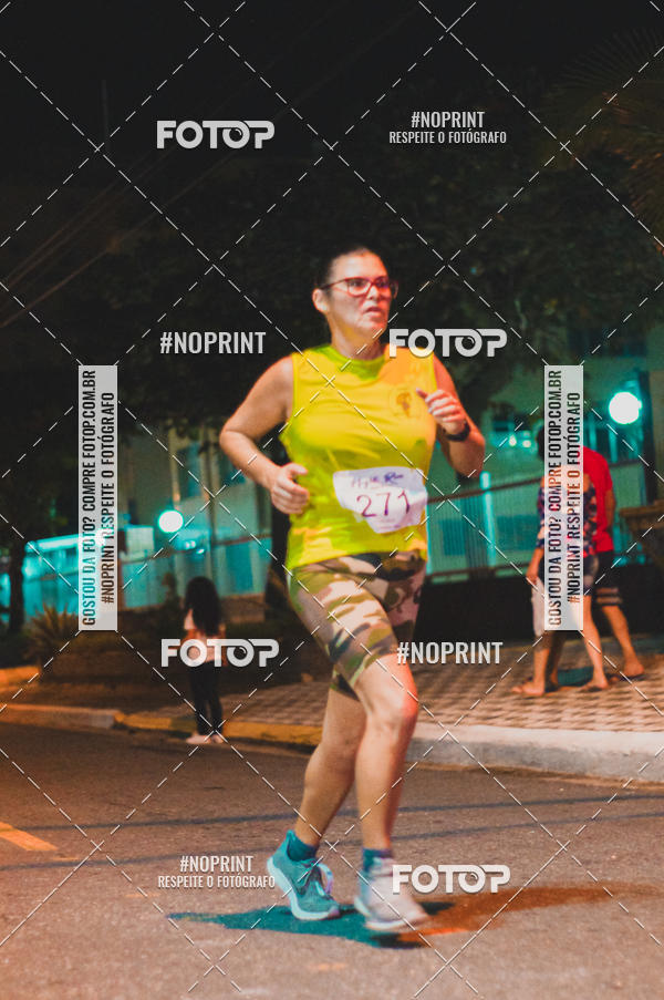 Buy your photos of the eventNight Run 5K 10K Praia Grande on Fotop