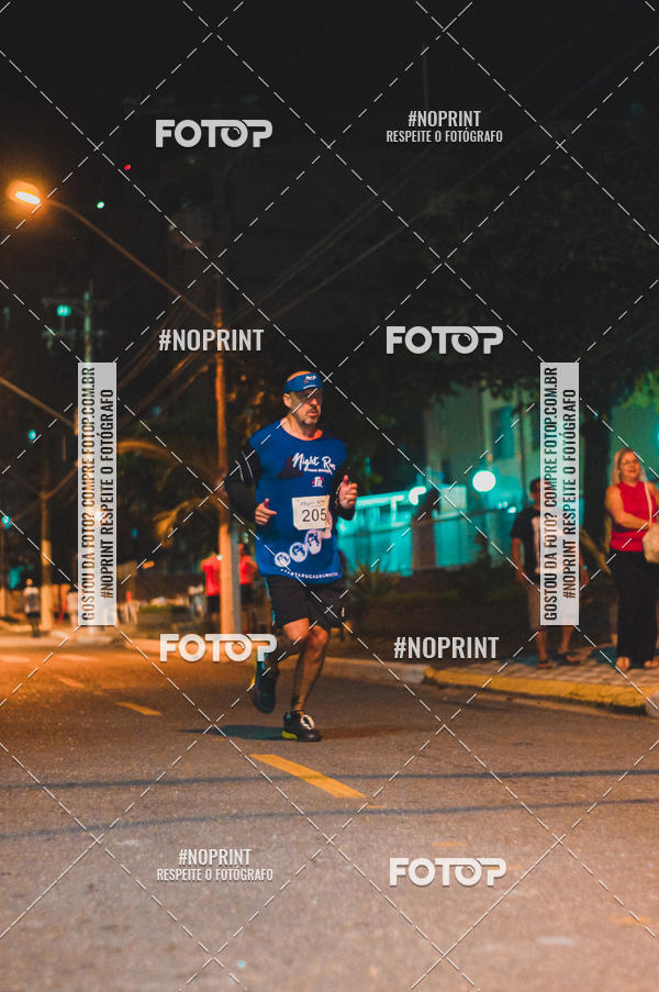 Buy your photos of the eventNight Run 5K 10K Praia Grande on Fotop