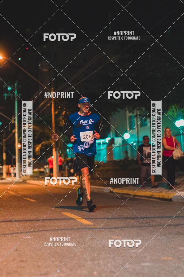 Buy your photos of the eventNight Run 5K 10K Praia Grande on Fotop
