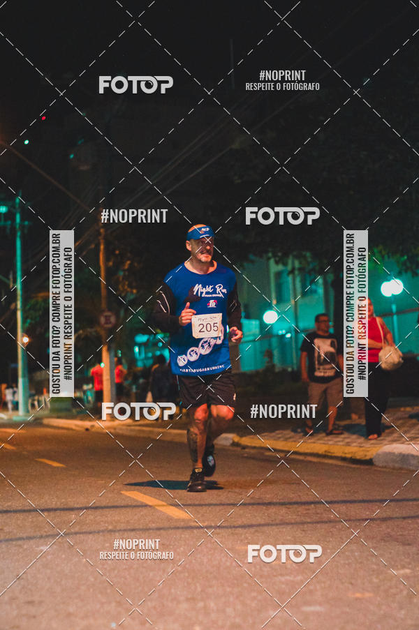 Buy your photos of the eventNight Run 5K 10K Praia Grande on Fotop