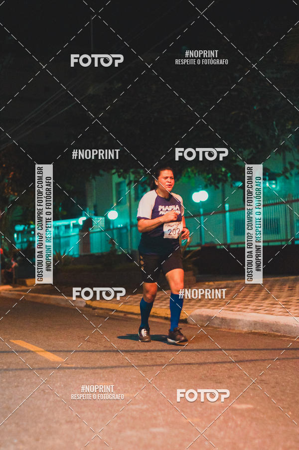 Buy your photos of the eventNight Run 5K 10K Praia Grande on Fotop