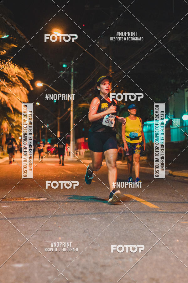 Buy your photos of the eventNight Run 5K 10K Praia Grande on Fotop