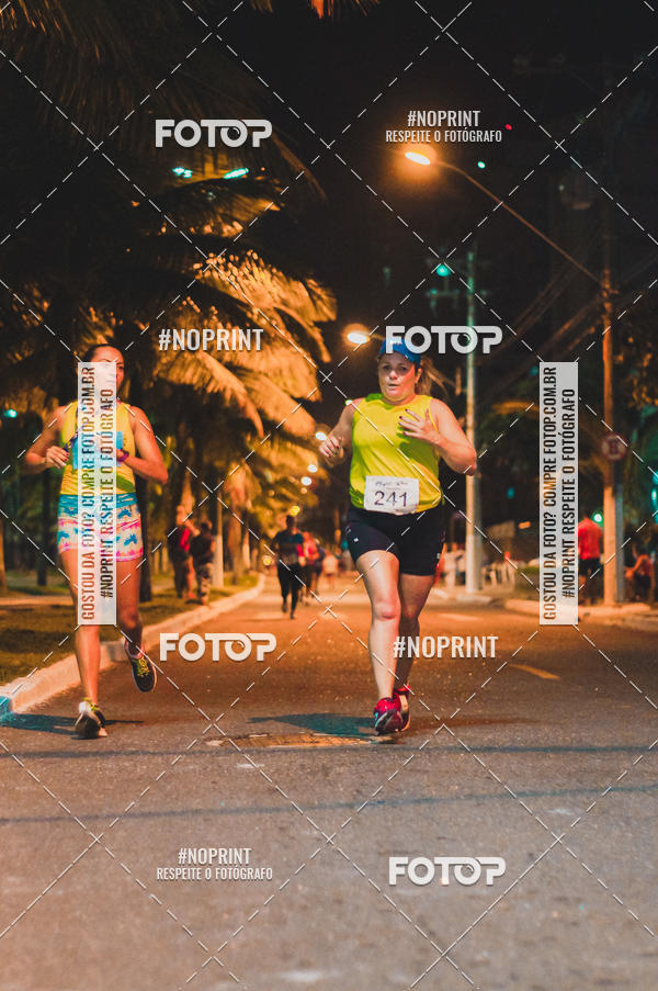 Buy your photos of the eventNight Run 5K 10K Praia Grande on Fotop