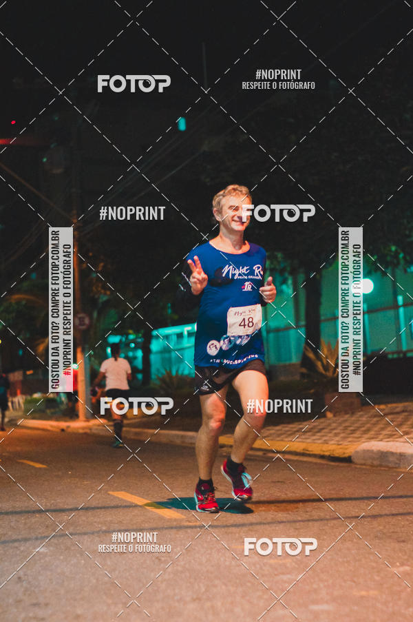 Buy your photos of the eventNight Run 5K 10K Praia Grande on Fotop