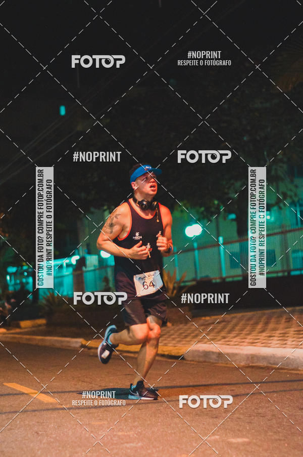 Buy your photos of the eventNight Run 5K 10K Praia Grande on Fotop