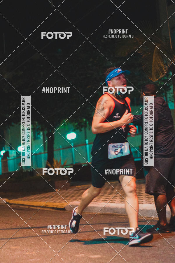 Buy your photos of the eventNight Run 5K 10K Praia Grande on Fotop