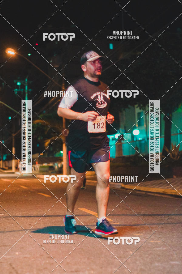 Buy your photos of the eventNight Run 5K 10K Praia Grande on Fotop